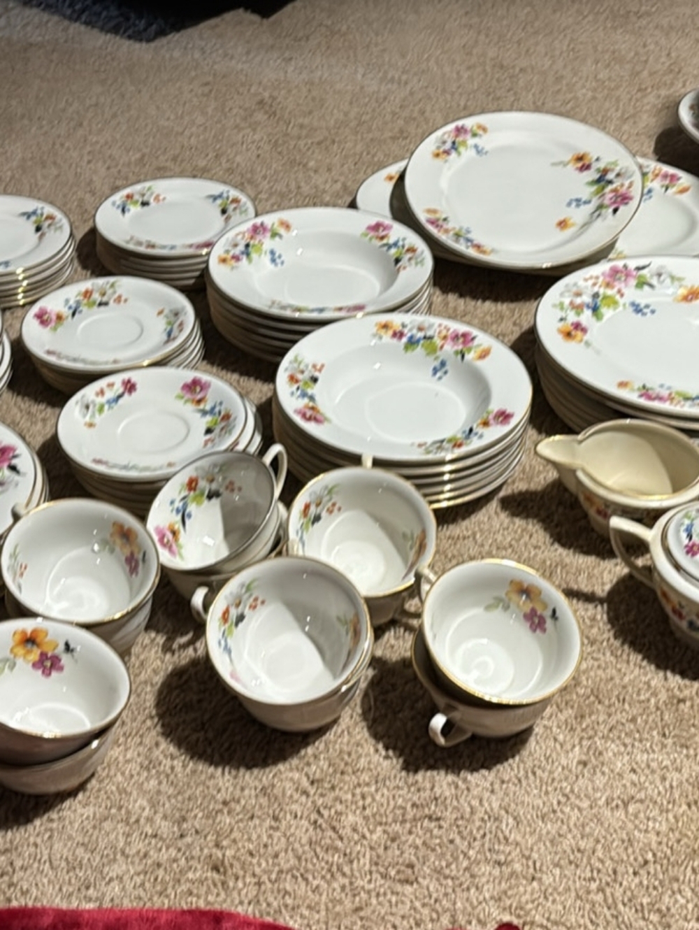 Fine White Porcelain Dinnerware Set with Floral Accent and Gold Trim